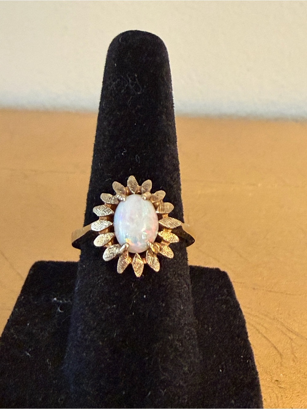 14k Gold Floral Opal Oval Ring Surrounded by Gold Leaves.